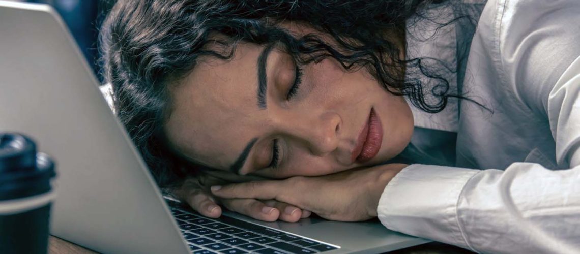 tired-working-women-sleeping-at-office-desk-hard-work-overnight-nap-african-american-black_t20_LJL8vz